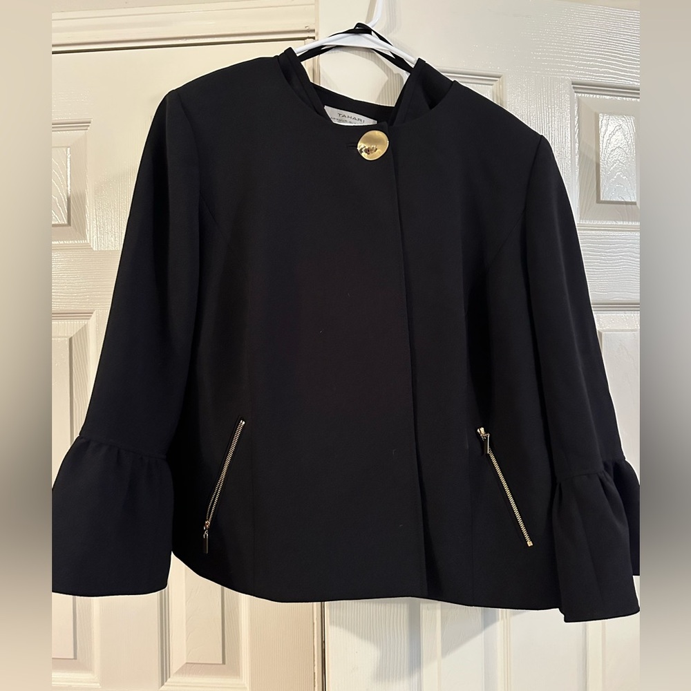 Women’s black suit with bell sleeves